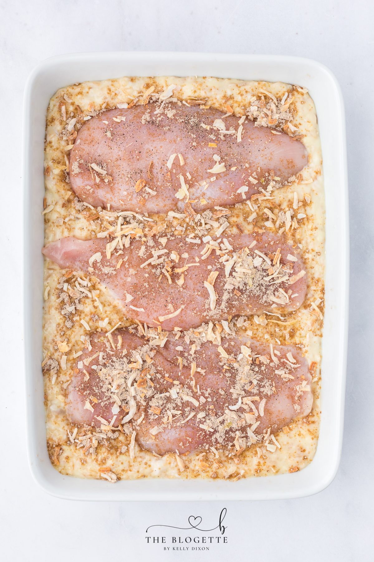 Sprinkle the onion soup mix evenly over the chicken.