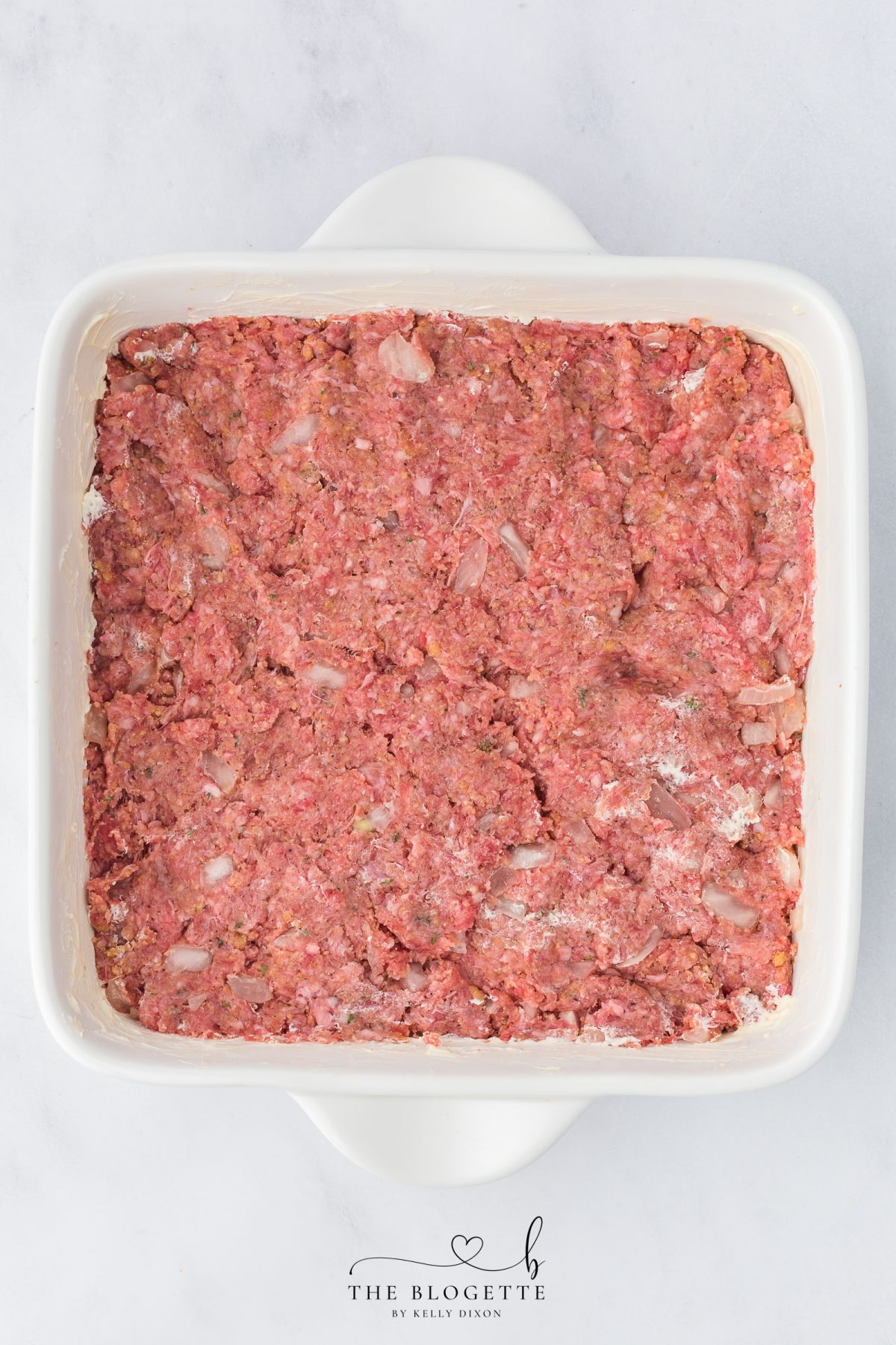 Add the meat to the baking dish