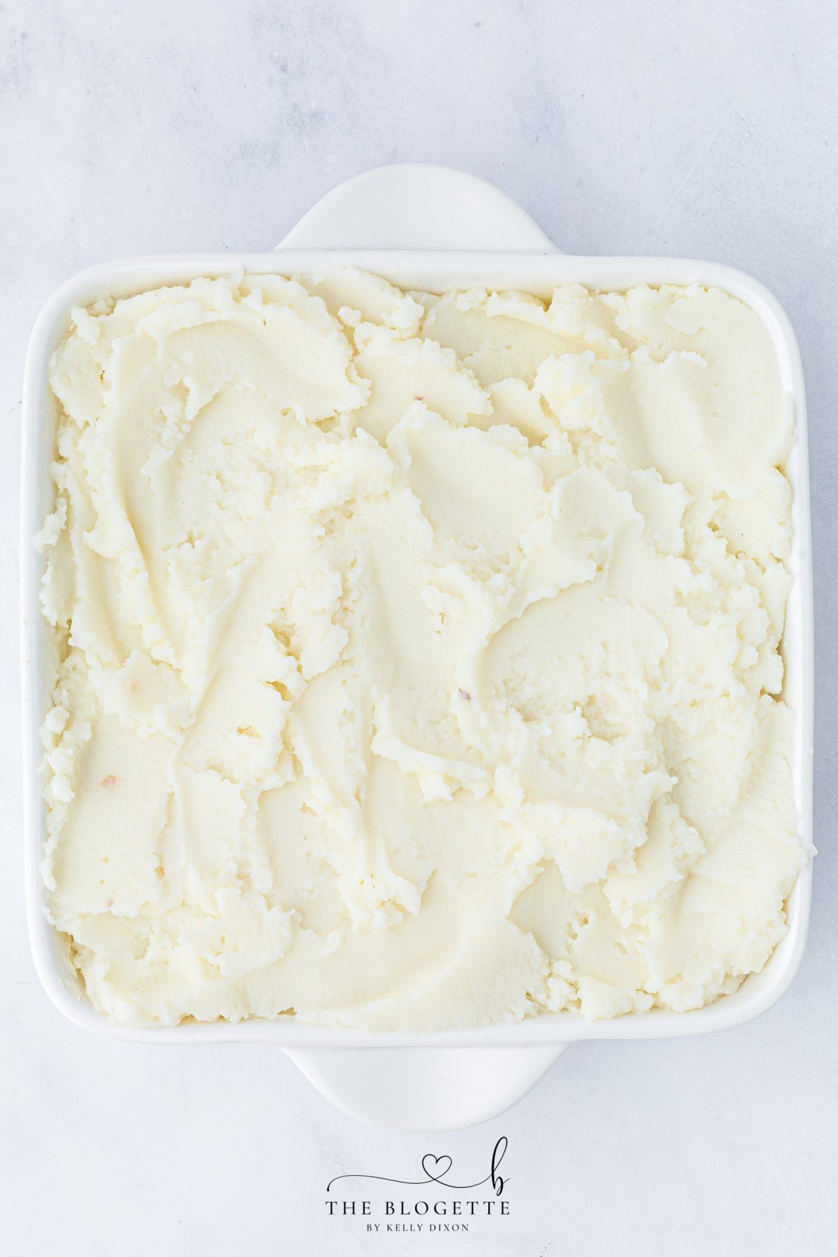 Layer the mashed potatoes