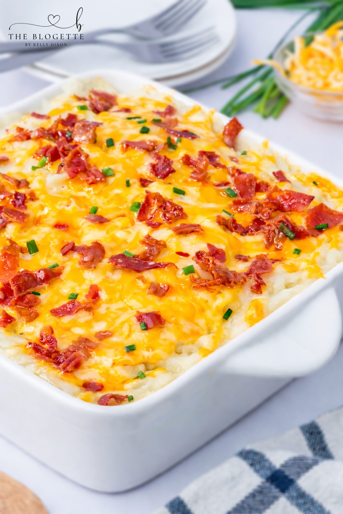 This Loaded Potato Meatloaf Casserole is the ultimate comfort food dinner. Layers of juicy meatloaf, creamy mashed potatoes, melted cheese, and crispy bacon make this easy casserole perfect for family dinners, meal prep, and freezer meals.