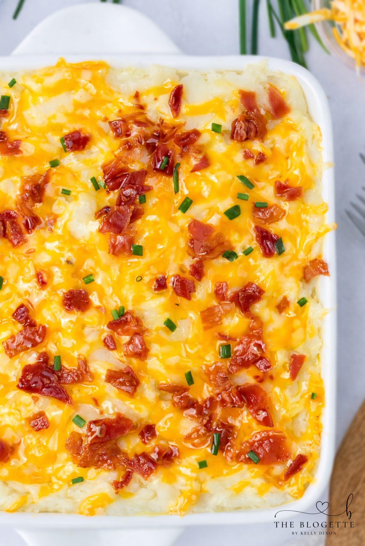 This Loaded Potato Meatloaf Casserole is the ultimate comfort food dinner. Layers of juicy meatloaf, creamy mashed potatoes, melted cheese, and crispy bacon make this easy casserole perfect for family dinners, meal prep, and freezer meals.