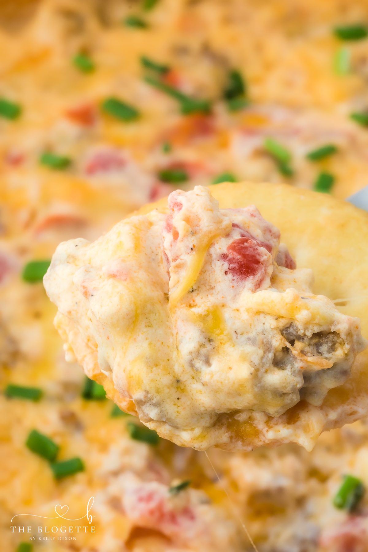 Hissy Fit Dip is the ultimate cheese and sausage dip loaded with cream cheese, Rotel, and melty shredded cheese. This easy appetizer recipe is perfect for game day, parties, and holidays.