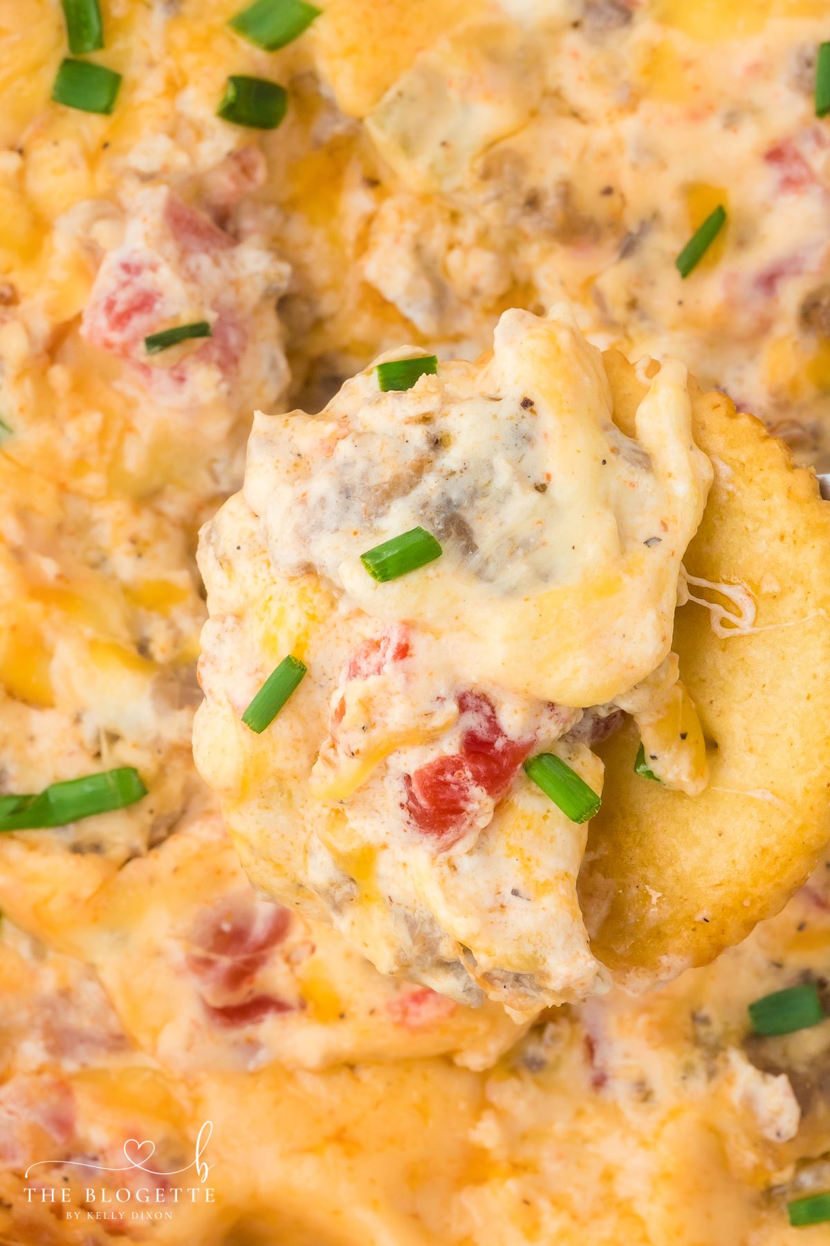 Hissy Fit Dip is the ultimate cheese and sausage dip loaded with cream cheese, Rotel, and melty shredded cheese. This easy appetizer recipe is perfect for game day, parties, and holidays.