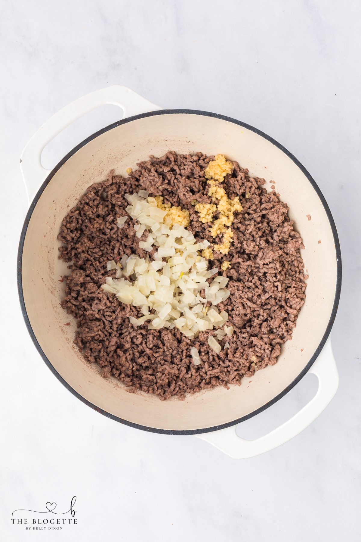 Add the diced onion and minced garlic