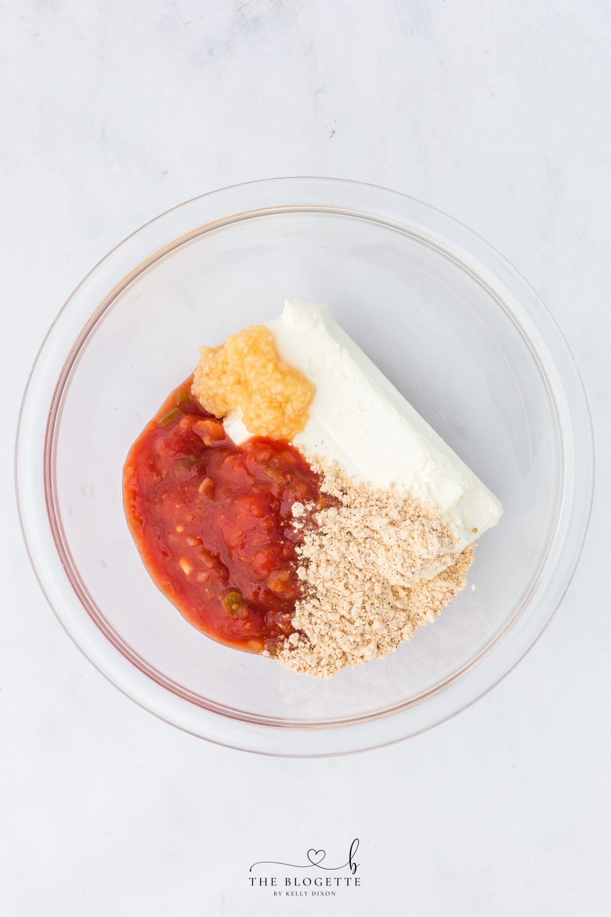 Mix cream cheese, salsa, fajita seasoning, and garlic.