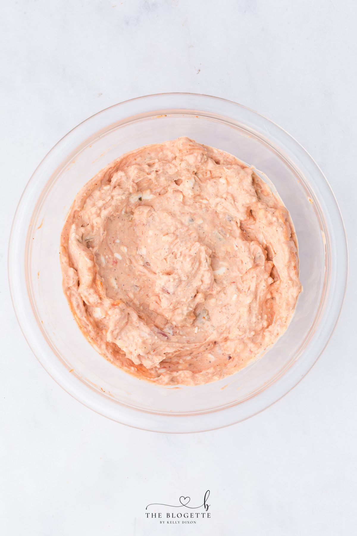 Mix cream cheese, salsa, fajita seasoning, and garlic.