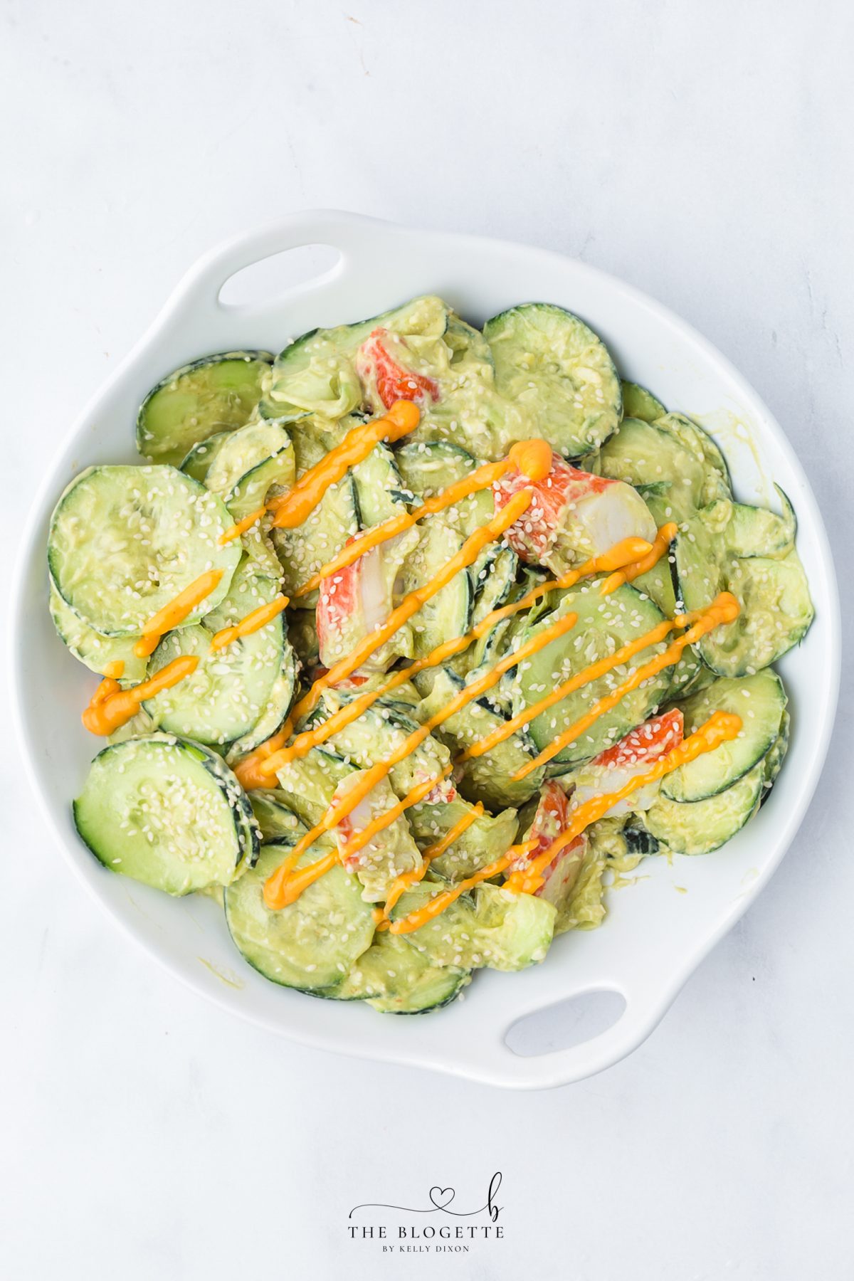 Top with extra spicy mayonnaise and sesame seeds