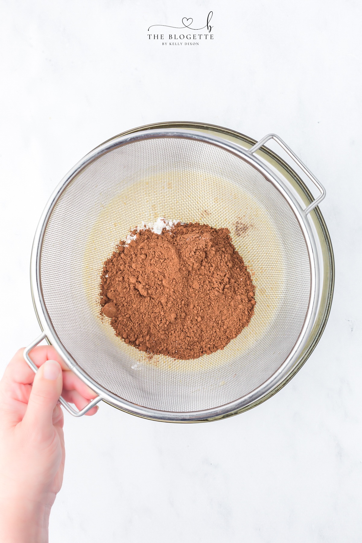 Sift the flour and cocoa powder into the batter