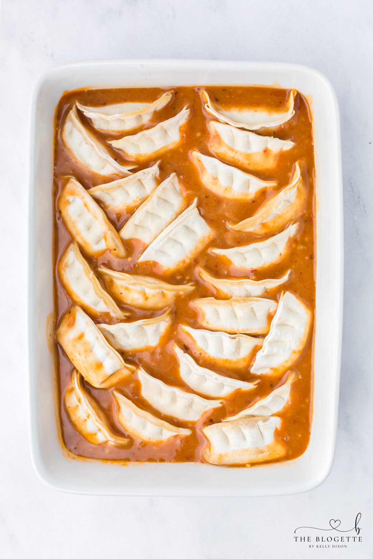 Place frozen potstickers in the sauce