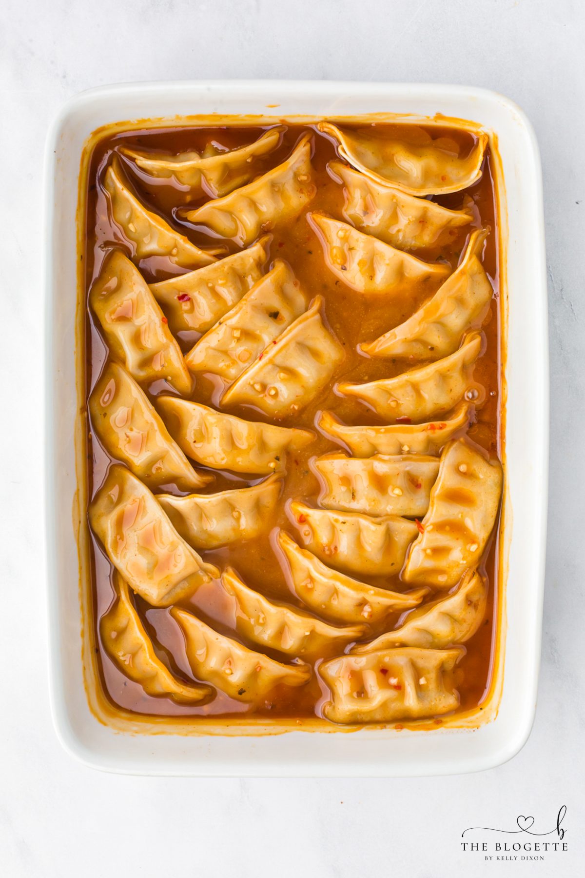 Place frozen potstickers in the sauce