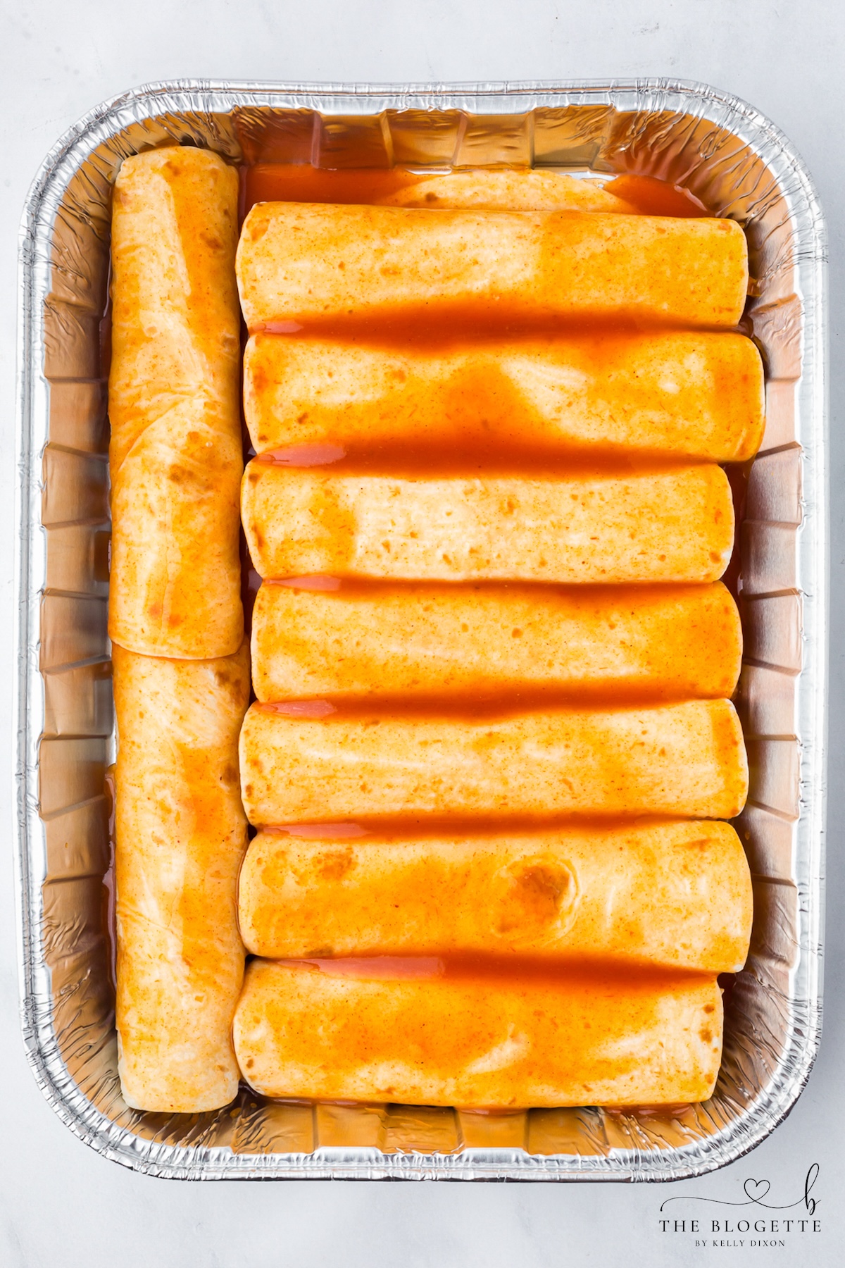 Cover with enchilada sauce