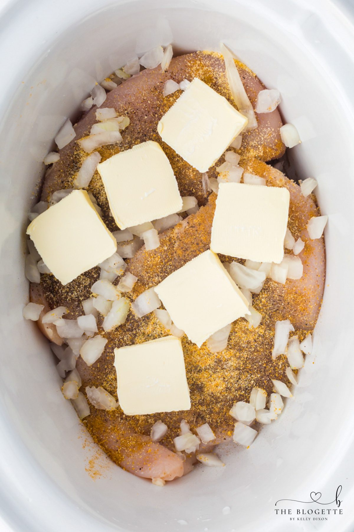 Cover the chicken with butter